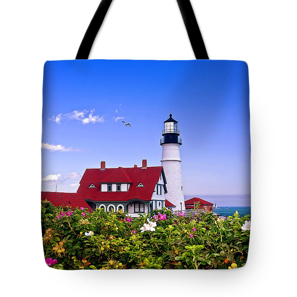 Maine Tote Bag featuring the photograph Portland Head Light and Roses by Mitchell R Grosky