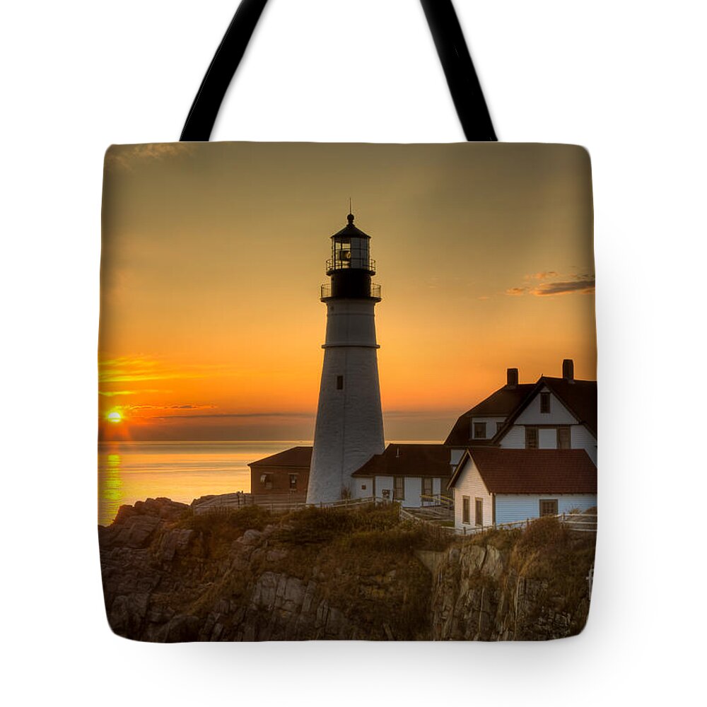 Clarence Holmes Tote Bag featuring the photograph Portland Head Light at Sunrise II by Clarence Holmes