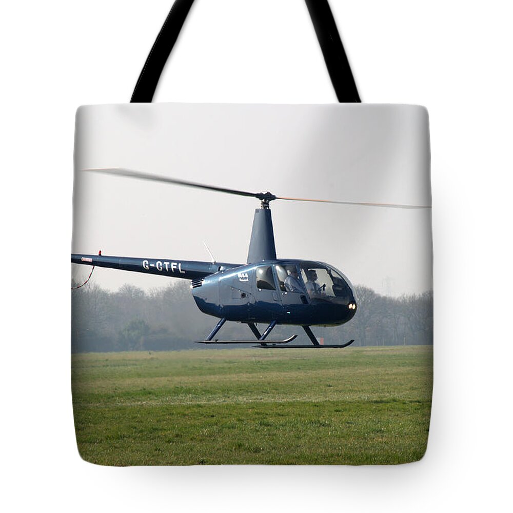 Helicopter Tote Bag featuring the photograph R44 Raven Helicopter by Chris Day