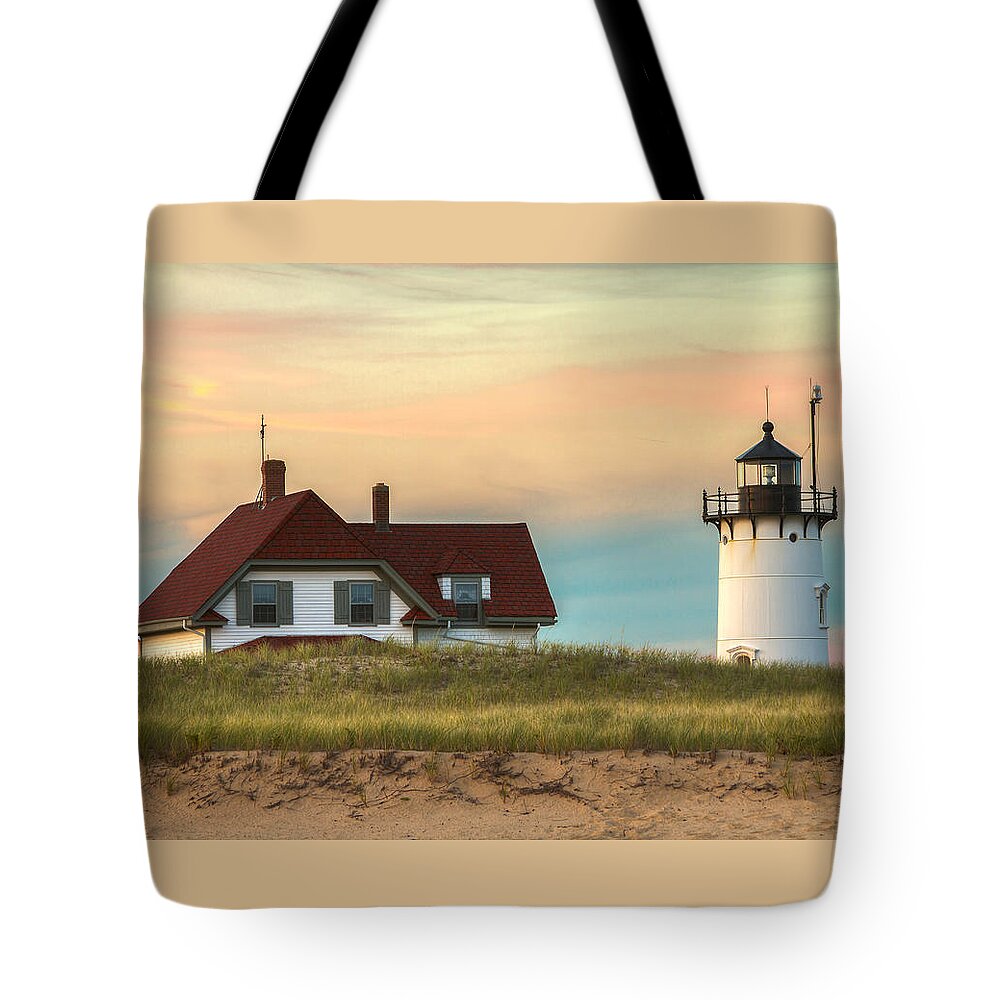Race Point Light Tote Bag featuring the photograph Race Point Light at Sunset by Brian Caldwell