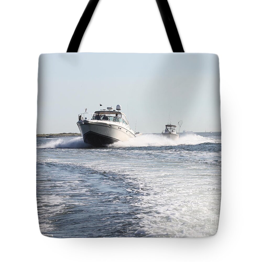 Racing To The Docks Tote Bag featuring the photograph Racing to the Docks by John Telfer