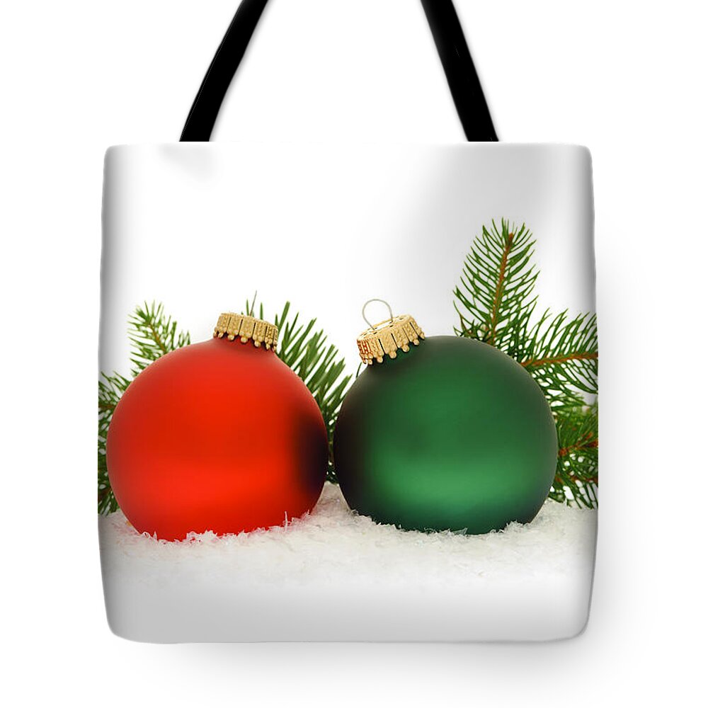 Christmas Tote Bag featuring the photograph Red and green Christmas baubles by Elena Elisseeva