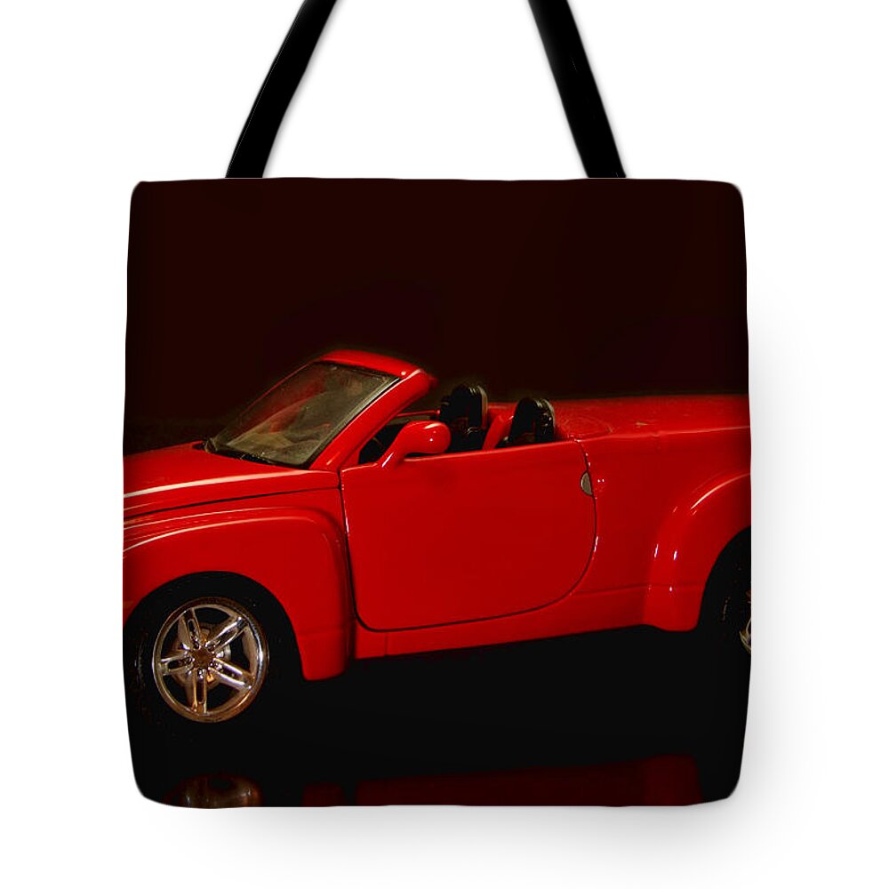 Transportation Tote Bag featuring the photograph Red Chevy SSR by Ron Roberts