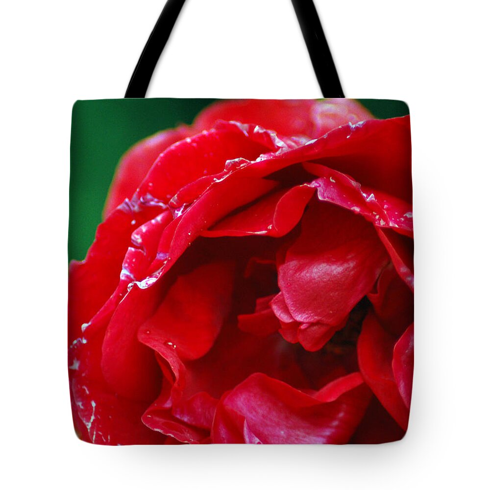 Red Tote Bag featuring the photograph Red Flower Wet by Matt Quest