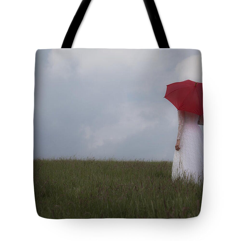 Alone Tote Bag featuring the photograph Red Parasol by Maria Heyens