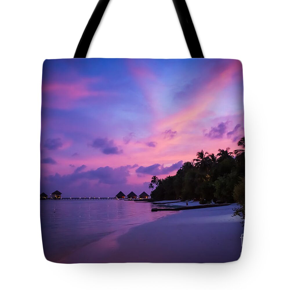 Beach Tote Bag featuring the photograph Red Sky Over Paradise by Hannes Cmarits