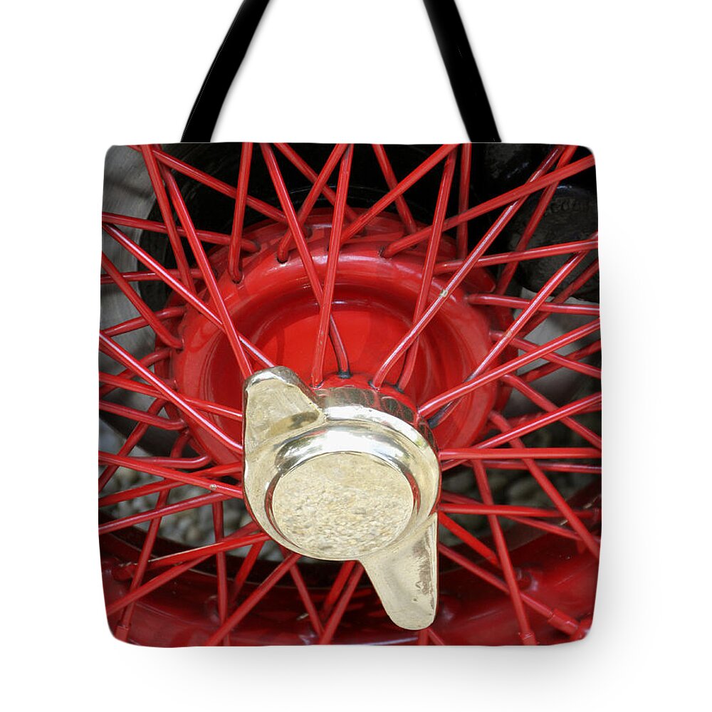 Tire Tote Bag featuring the photograph Red Spokes by Bob Slitzan