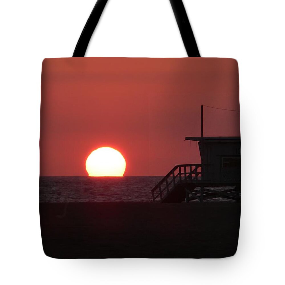 Beach Tote Bag featuring the photograph Red Suset by Steve Ondrus
