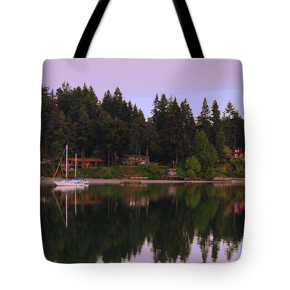 Landscape Tote Bag featuring the photograph Reflection of a calm harbor by Kym Backland