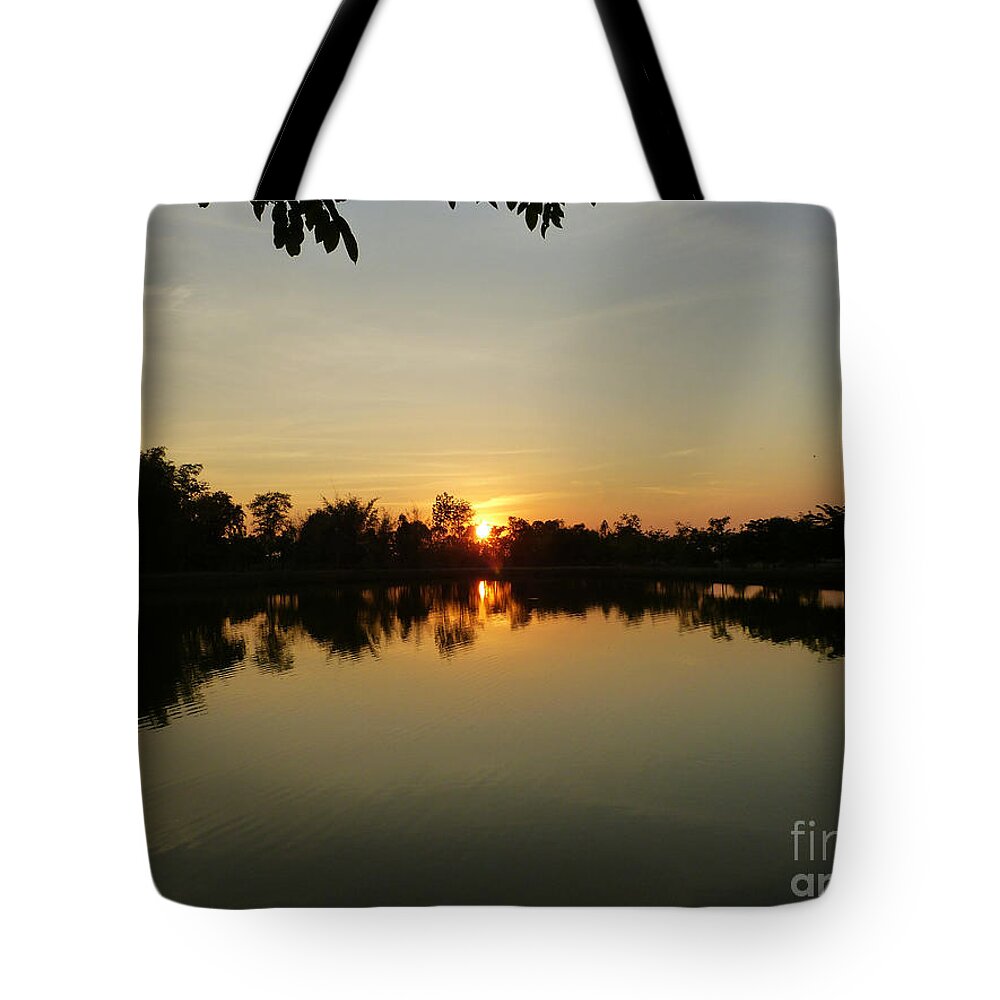 Sunset Tote Bag featuring the photograph Reflections at Dusk by Marguerita Tan