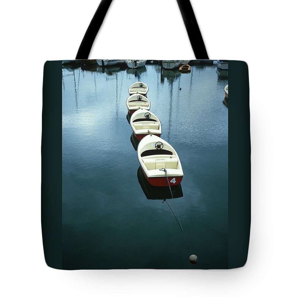 Motor Tote Bag featuring the photograph Rental Motor Boats in a Line by Gordon James