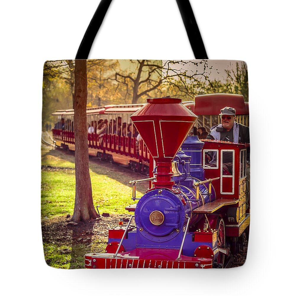 Train Tote Bag featuring the photograph Riding out of the Sunset on the Hermann Park Train by David Morefield