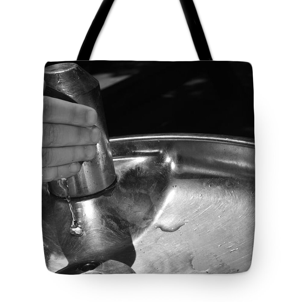 Hand Tote Bag featuring the photograph Rinse and Repeat by Meganne Peck