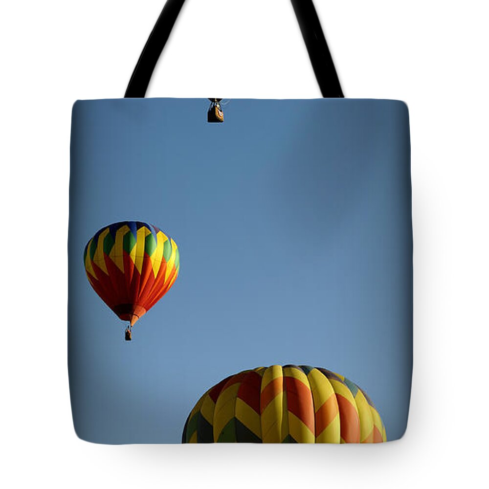 Hot Tote Bag featuring the photograph Rise Above by Luke Moore