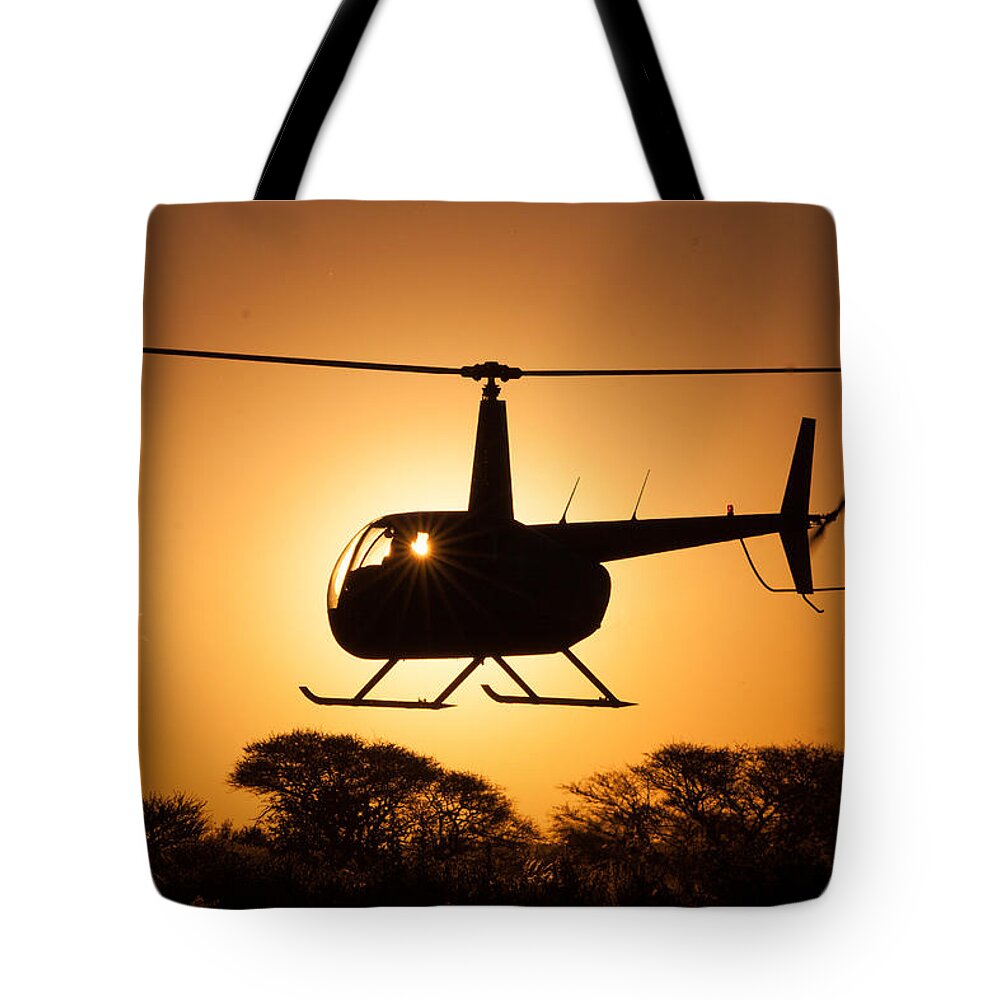 Robinson R44 Ravine Ii Tote Bag featuring the photograph Robbie Sun by Paul Job