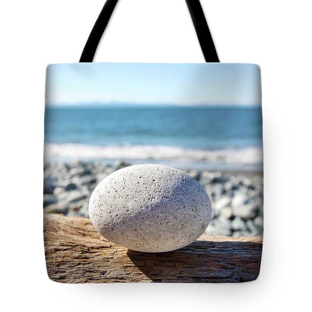 Toughness Tote Bag featuring the photograph Rock On Log by Grant Faint