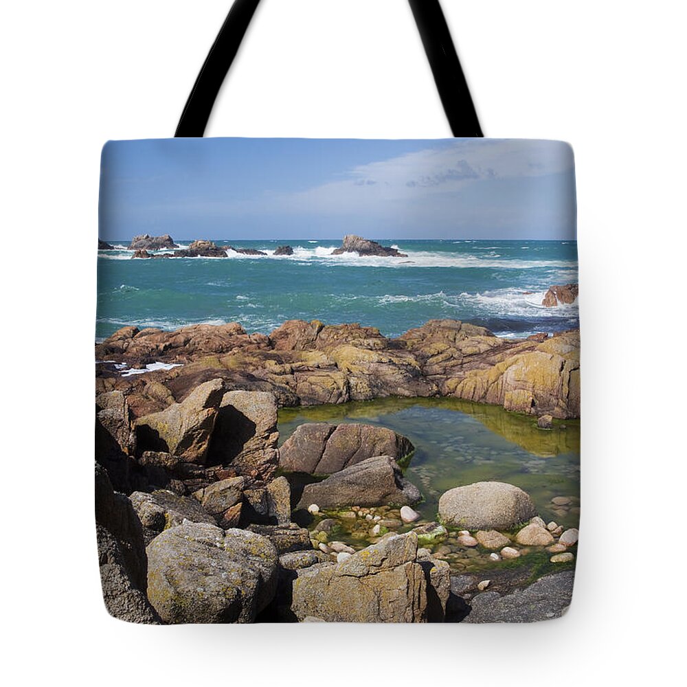 Flpa Tote Bag featuring the photograph Rocky Shore And La Corbiere Lighthouse by Bill Coster