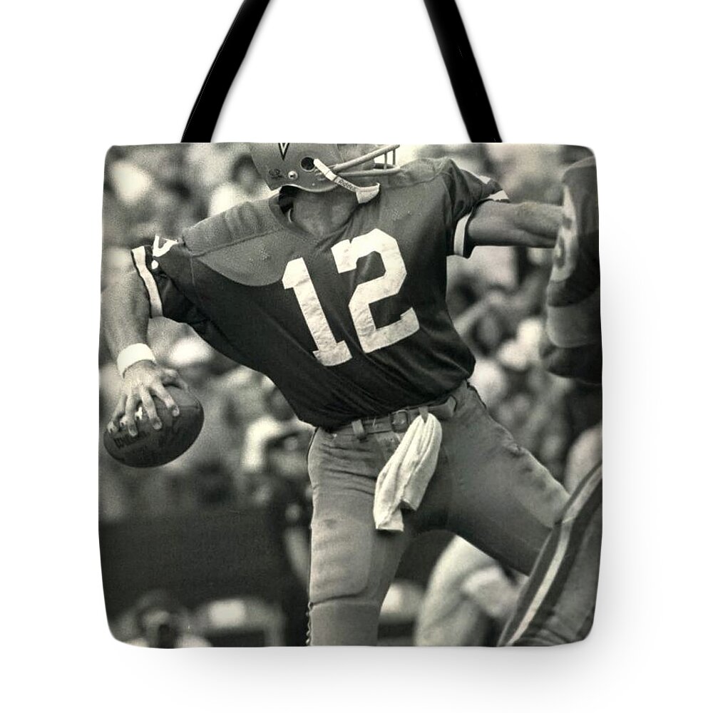 Roger Tote Bag featuring the photograph Roger Staubach Vintage NFL Poster by Gianfranco Weiss