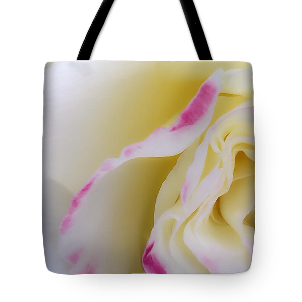 Abstract Tote Bag featuring the photograph Rose by Jonathan Nguyen