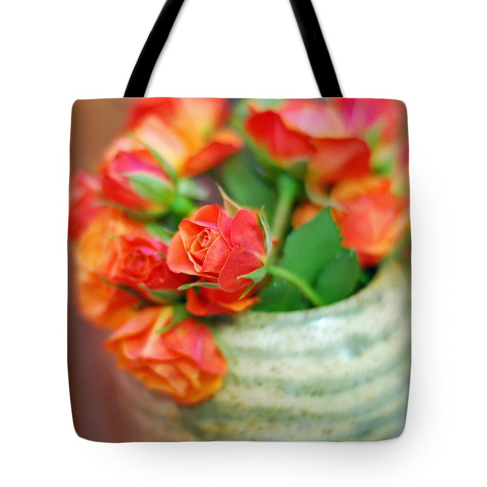 Rosa Berberifolia Tote Bag featuring the photograph Roses by Lisa Phillips