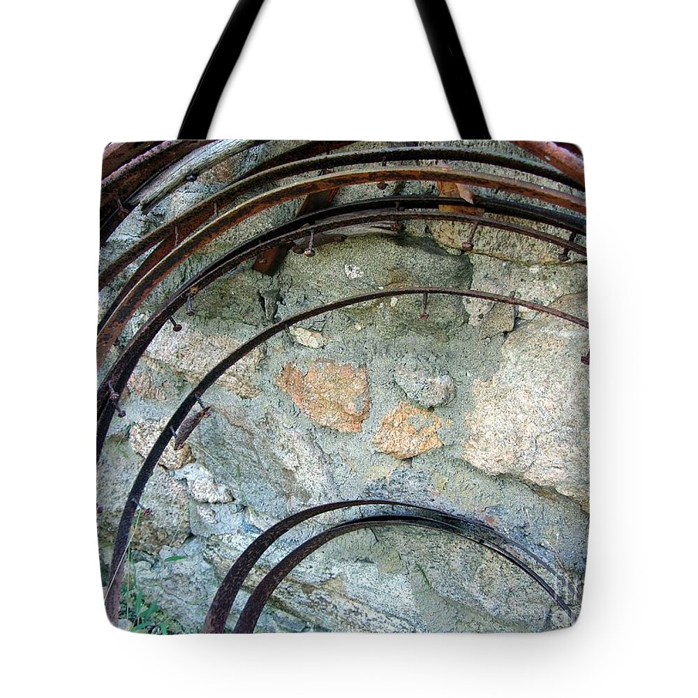 Rust Tote Bag featuring the photograph Rusted Rims - Blacksmith Shop - Waterloo Village by Susan Carella