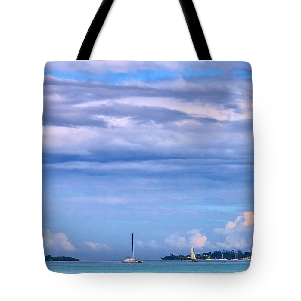 Sailing Tote Bag featuring the photograph Sail at Sea by Debbie Levene