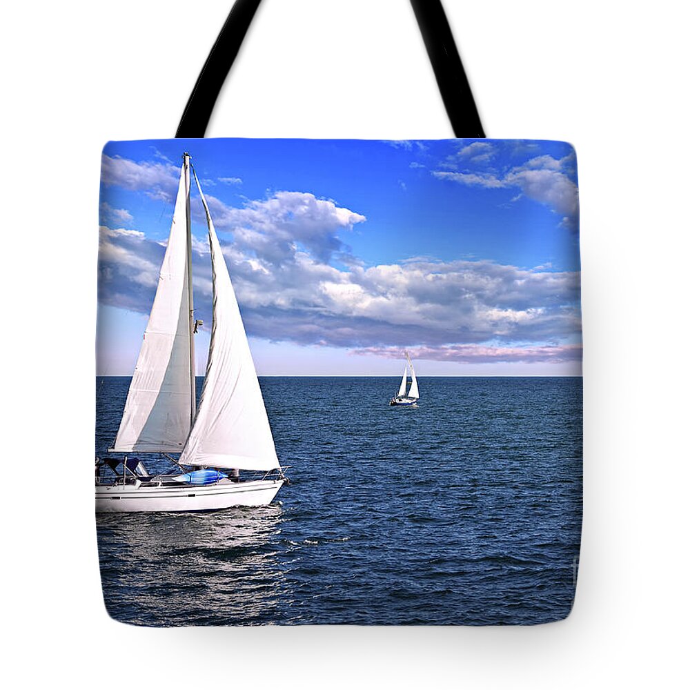 Boat Tote Bag featuring the photograph Sailboats at sea by Elena Elisseeva