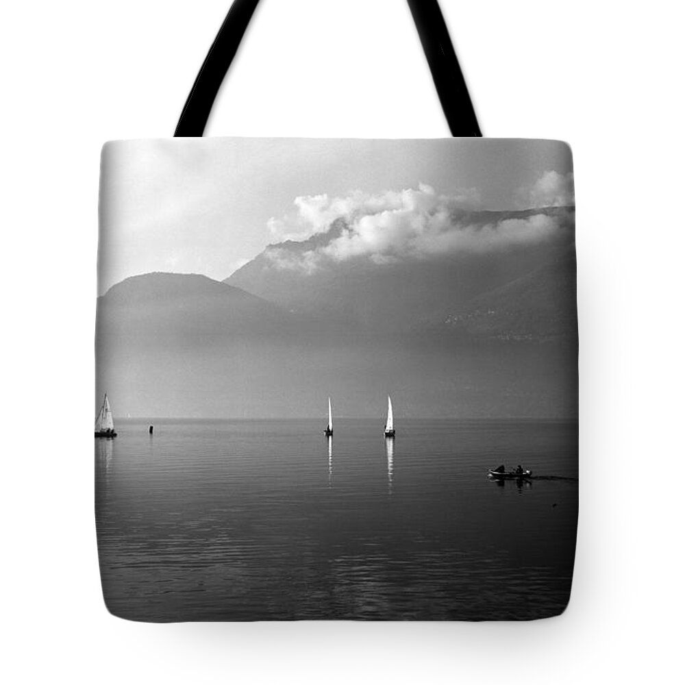 Lario Tote Bag featuring the photograph Sailing boats on Como Lake by Riccardo Mottola