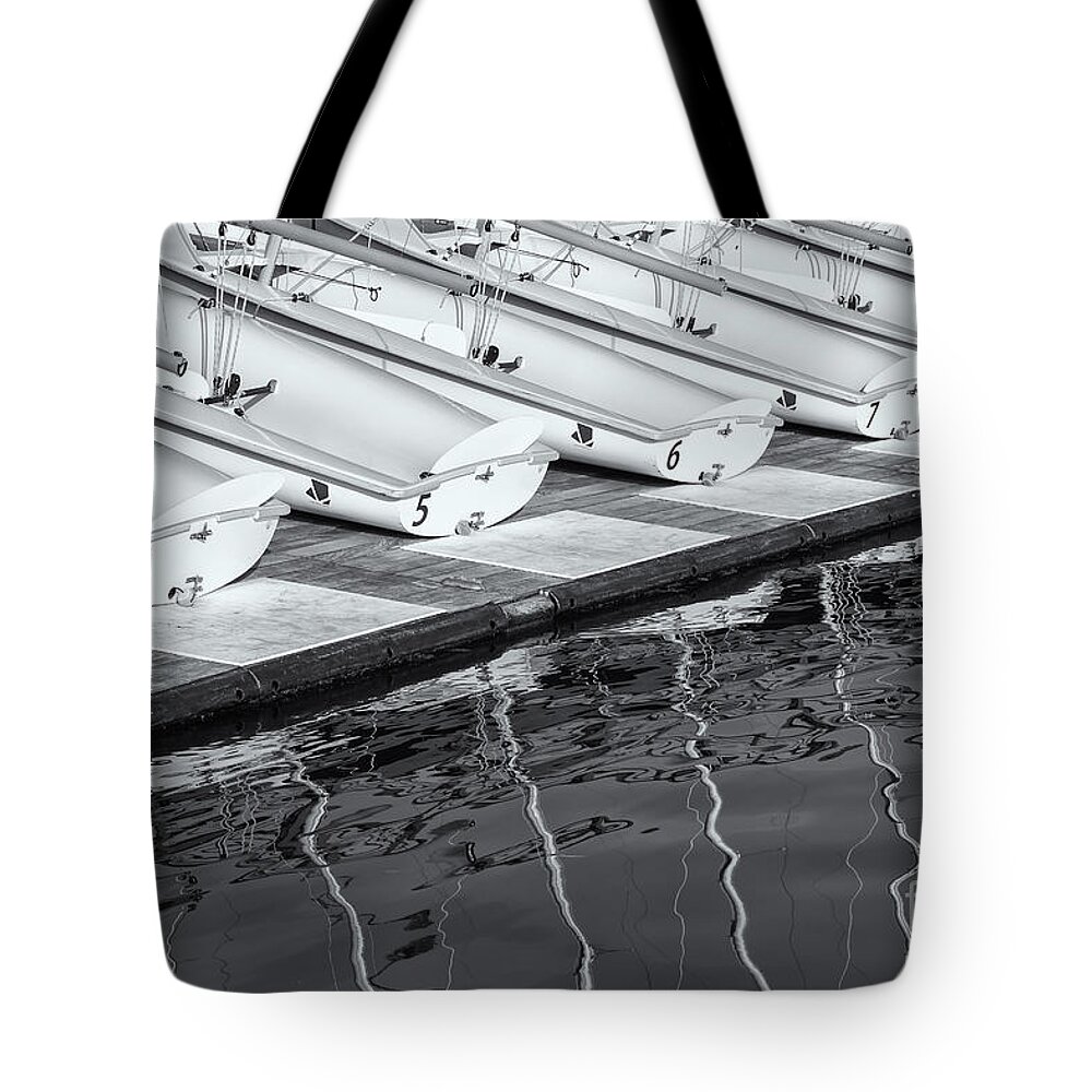 Clarence Holmes Tote Bag featuring the photograph Sailing Dinghies and Reflections II by Clarence Holmes
