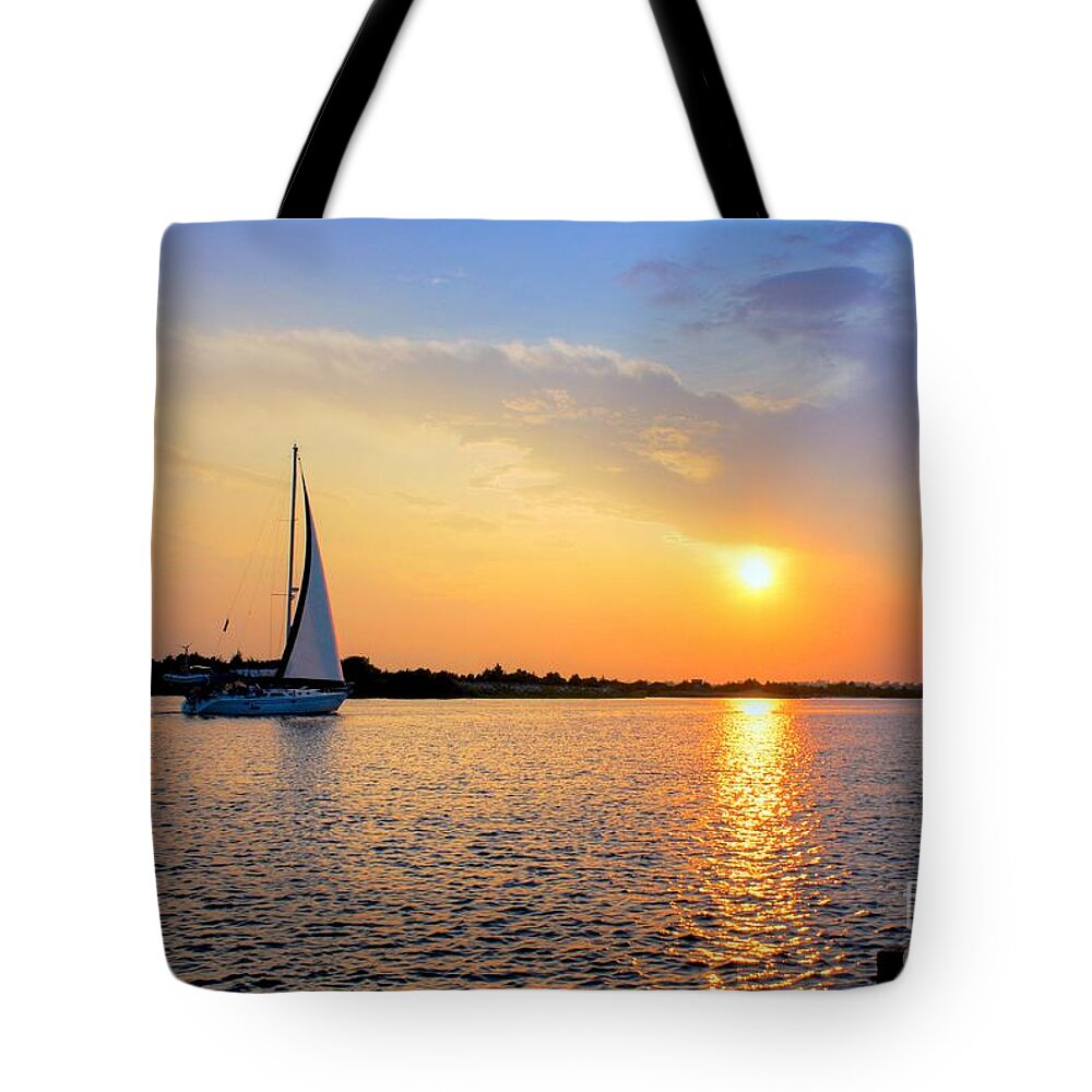 Sailing Tote Bag featuring the photograph Sailing Into The Sunset by Benanne Stiens