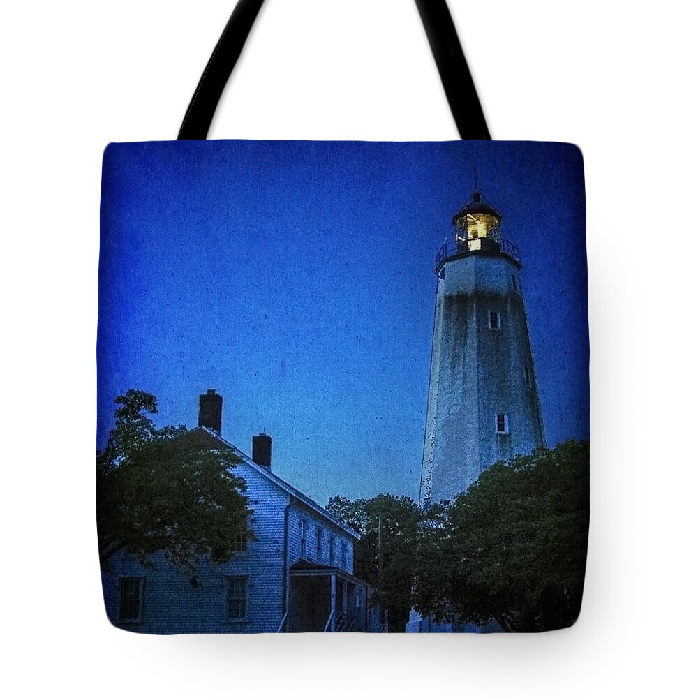 Lighthouse Tote Bag featuring the photograph Sandy Hook Lighthouse at Twilight by Debra Fedchin