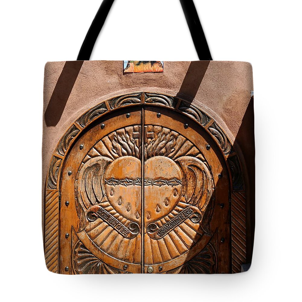 New Tote Bag featuring the photograph Santuario de Chimayo Door by Christiane Schulze Art And Photography