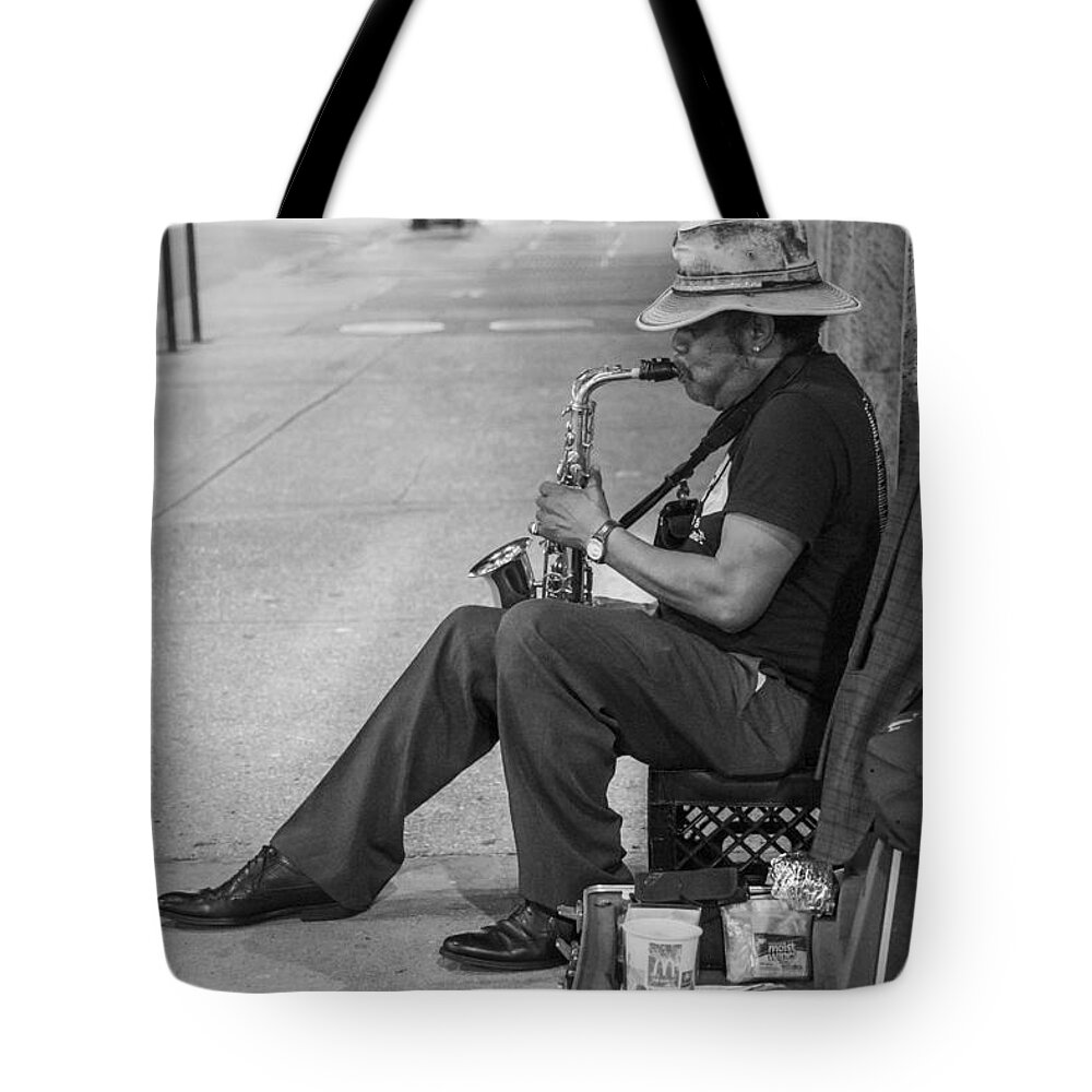 Chicago Tote Bag featuring the photograph Sax Player from the side by John McGraw