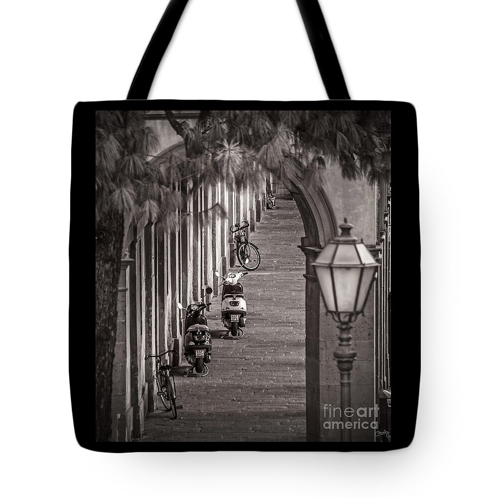 Lucca Tote Bag featuring the photograph Scooters and Bikes by Prints of Italy
