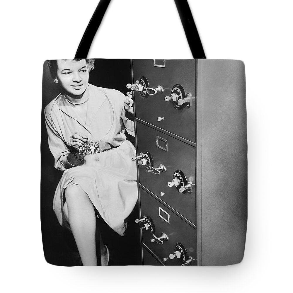 1035-419 Tote Bag featuring the photograph Secure Filing Cabinet by Underwood Archives