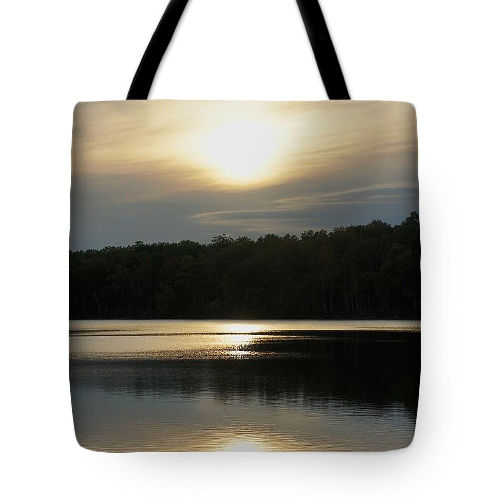 Sun Tote Bag featuring the photograph Setting Sun Reflections on Lake by Lilliana Mendez