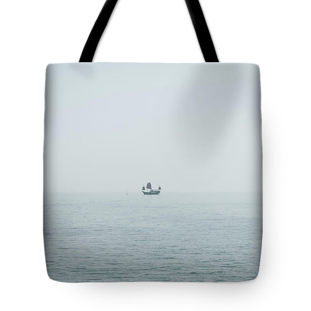 Tranquility Tote Bag featuring the photograph Ship Sailing Across Seascape by D3sign