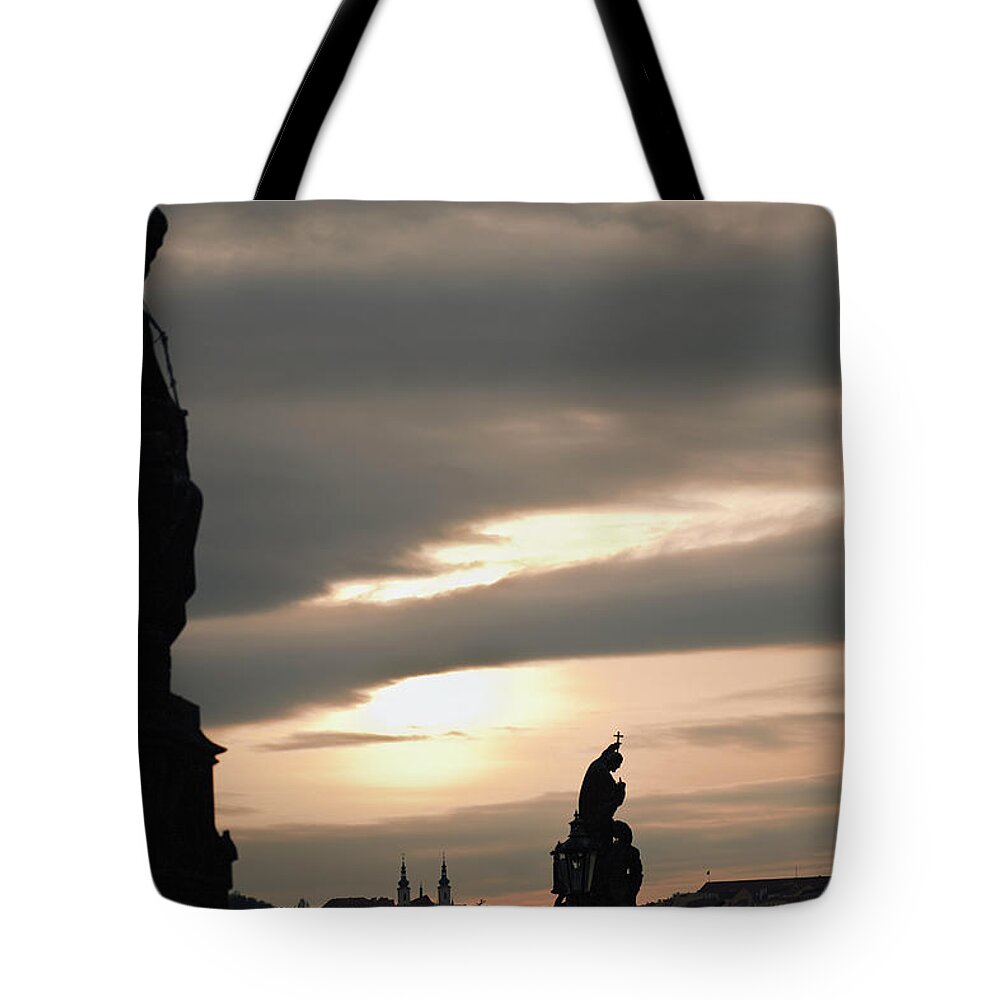 Art Tote Bag featuring the photograph Silhouette Of Statues And Buildings At by Terence Waeland / Design Pics