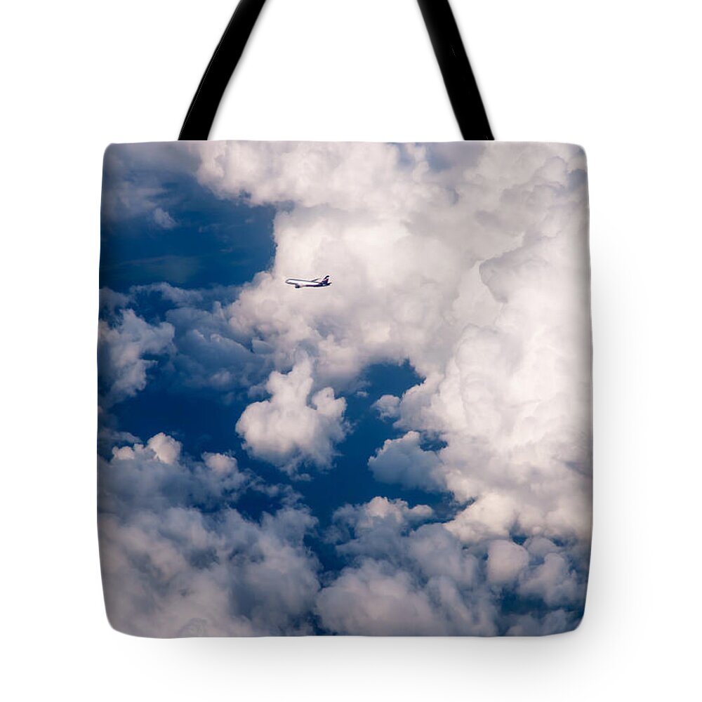 Clouds Tote Bag featuring the photograph Silver Flight through the Clouds by Jenny Rainbow