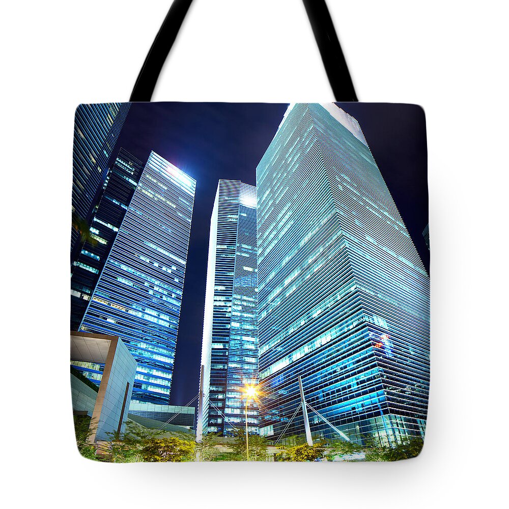 Financial Building Tote Bag featuring the photograph Singapore Business Building At Night by Ngkaki