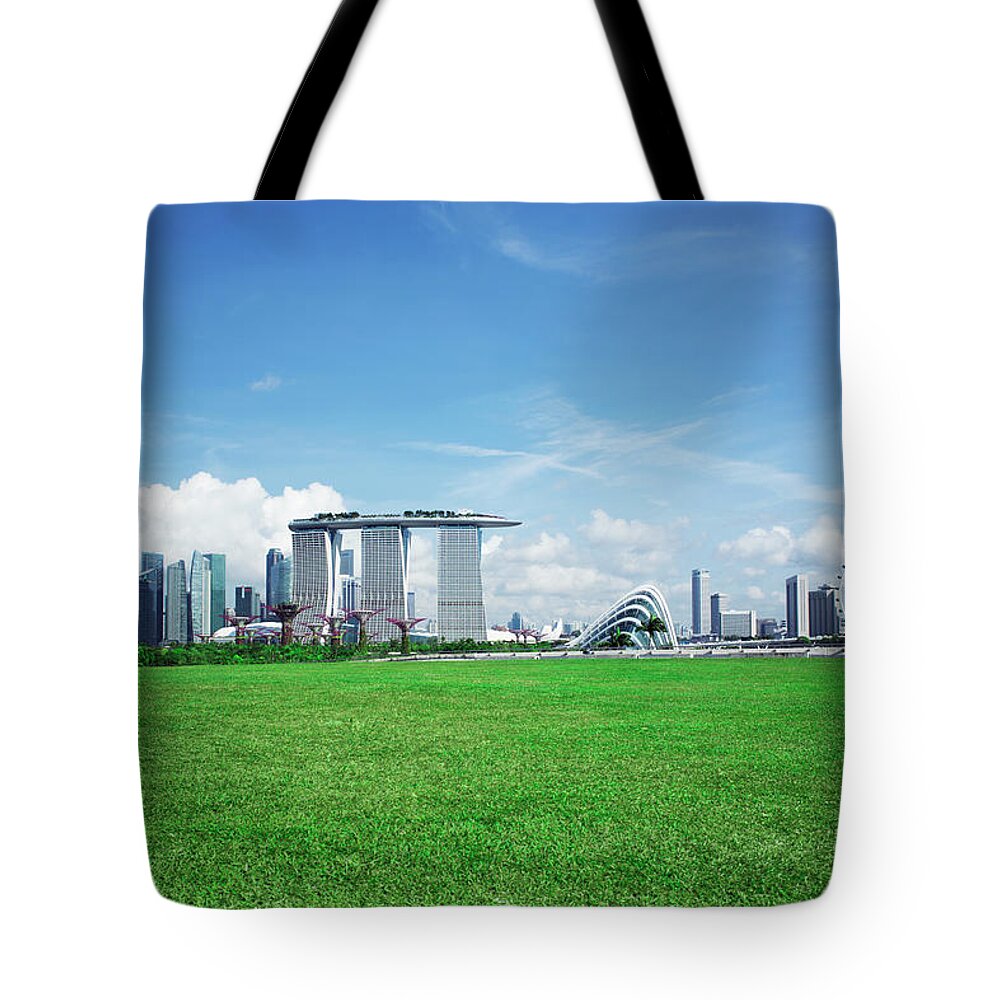 Tranquility Tote Bag featuring the photograph Singapore Skyline And Gardens By The Bay by Eternity In An Instant