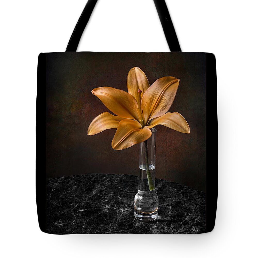 Flower Tote Bag featuring the photograph Single Asiatic Lily in Vase by Endre Balogh