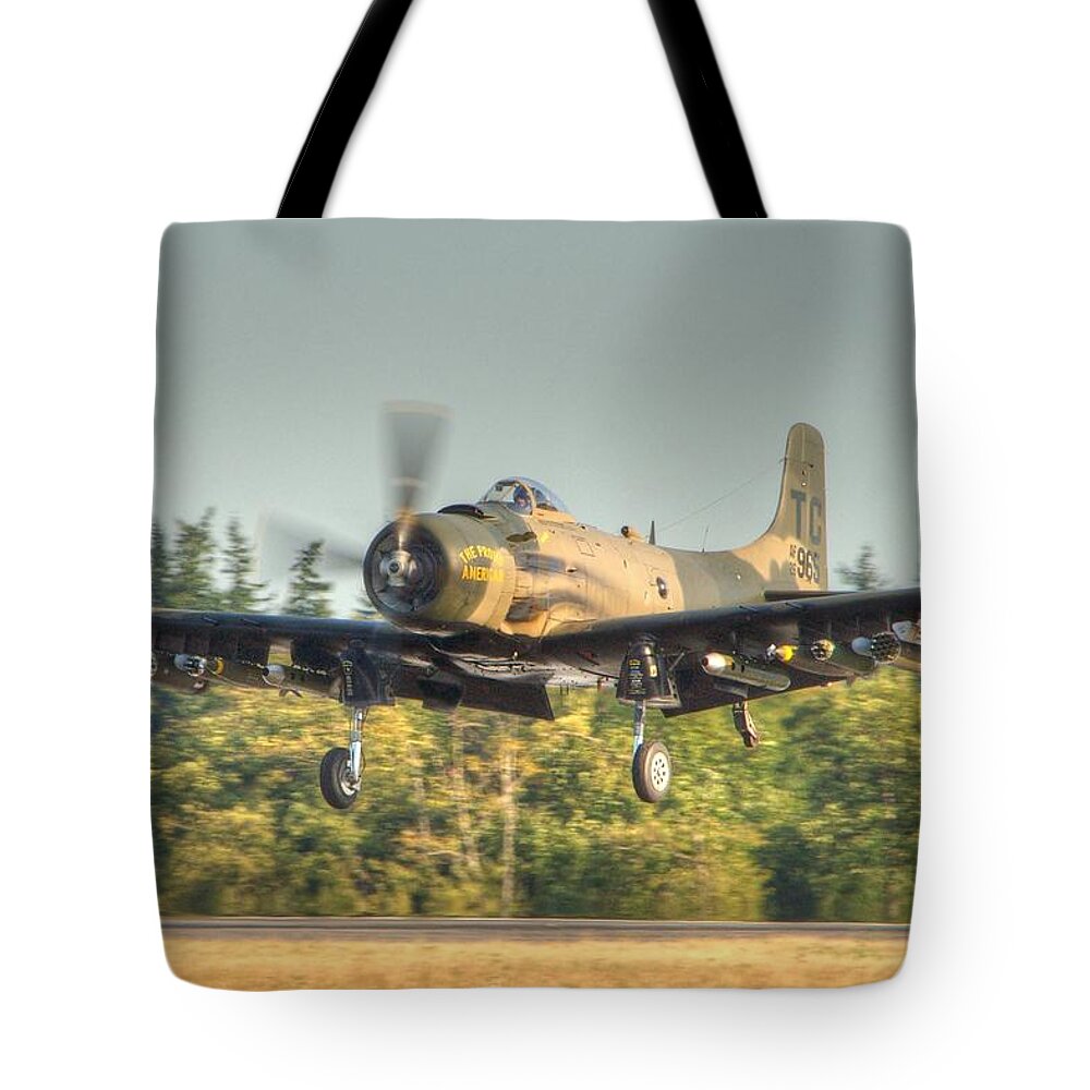 Skyraider Tote Bag featuring the photograph Skyraider by Jeff Cook