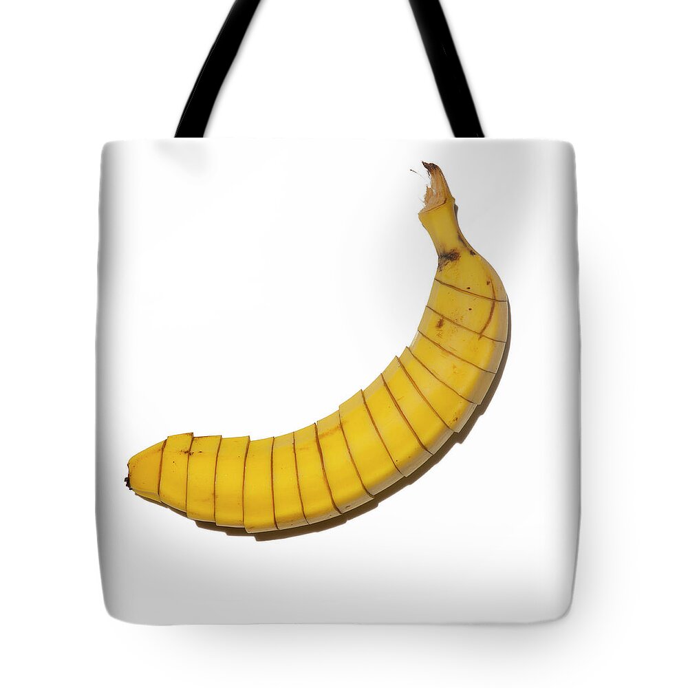 White Background Tote Bag featuring the photograph Sliced Banana On White Background by Maciej Toporowicz, Nyc
