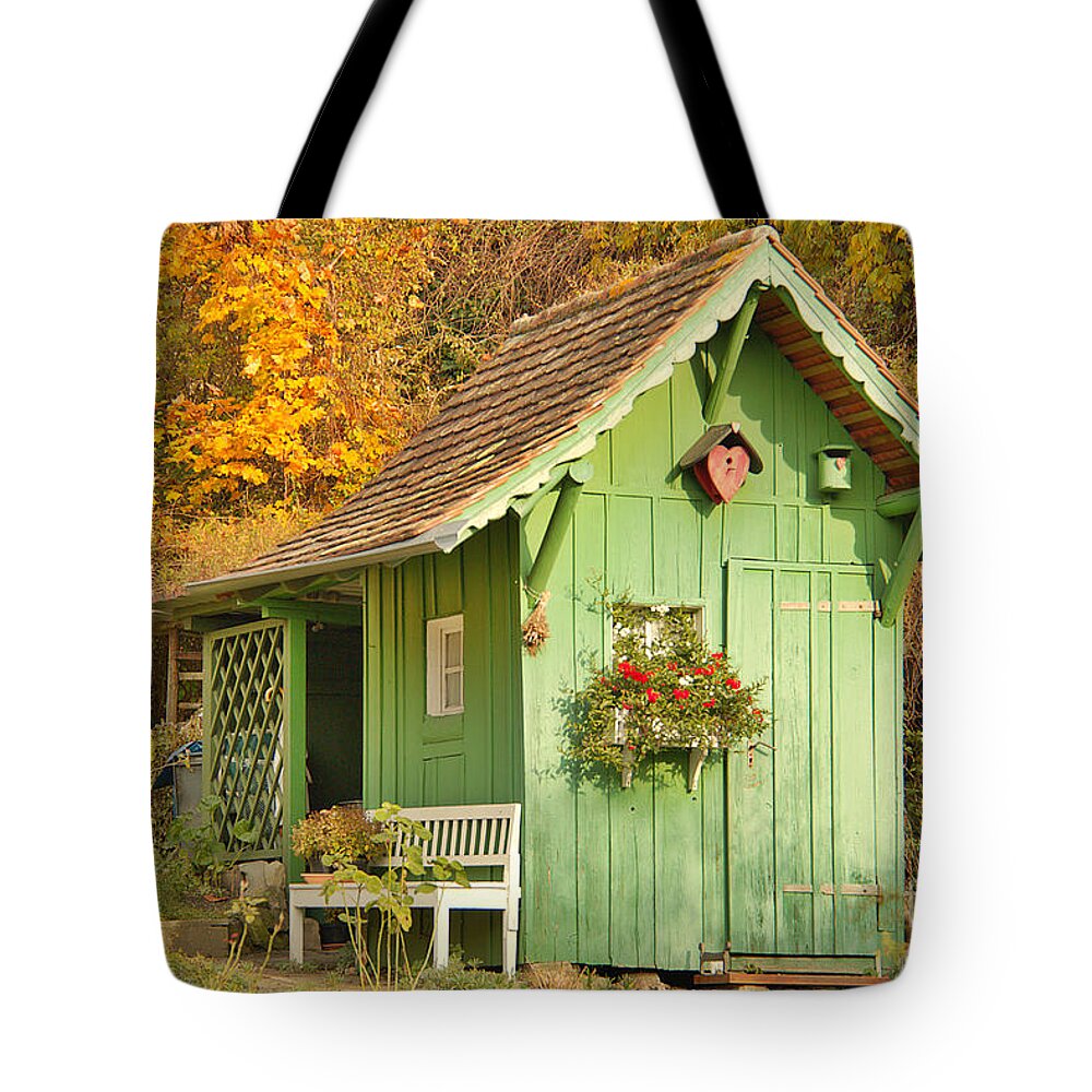 Architecture Tote Bag featuring the photograph Small garden House by Amanda Mohler
