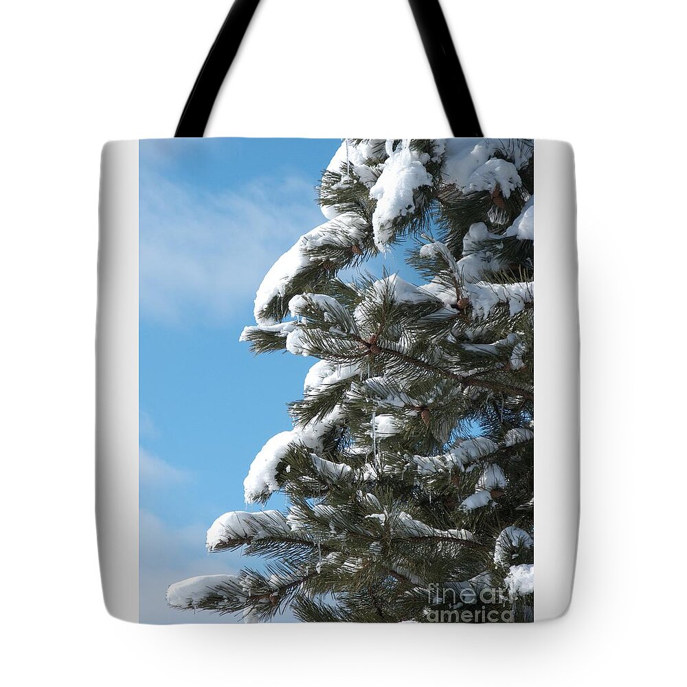 Snow Tote Bag featuring the photograph Snow-Clad Pine by Ann Horn
