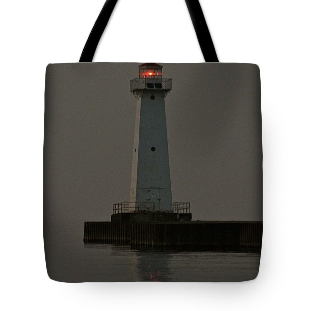 Light Tote Bag featuring the photograph Sodus Point Beacon by Justin Connor