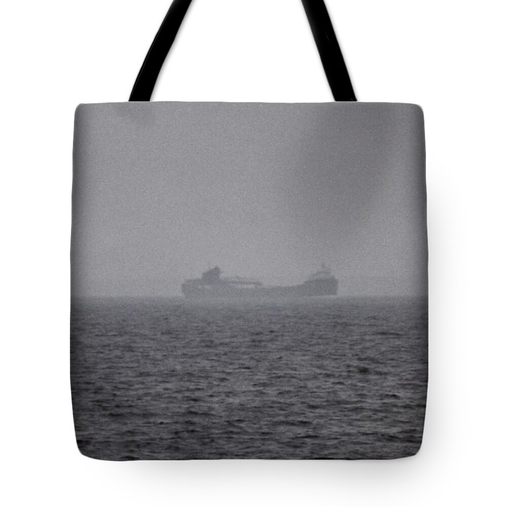 Lakers Tote Bag featuring the photograph Spectors of the Straits by Daniel Thompson