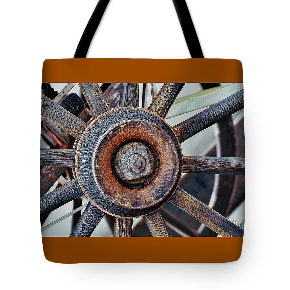 Wagon Wheel Spokes Tote Bag featuring the photograph Spokes and Hub by Kae Cheatham