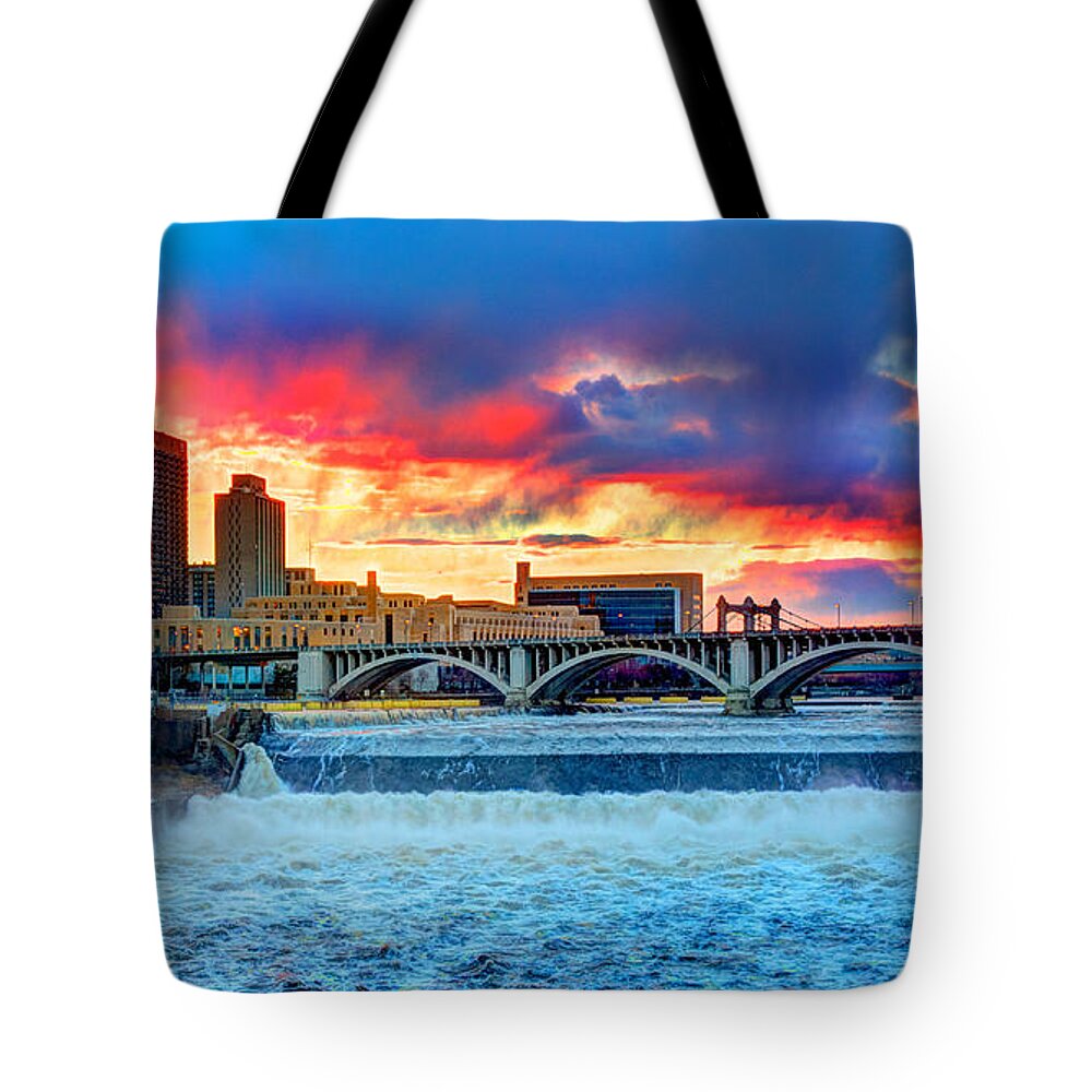 Saint Anthony Falls Tote Bag featuring the photograph Spring Melt on the Mississippi by Amanda Stadther